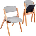 Folding Chair with an Upholstered Seat in Solid Ash