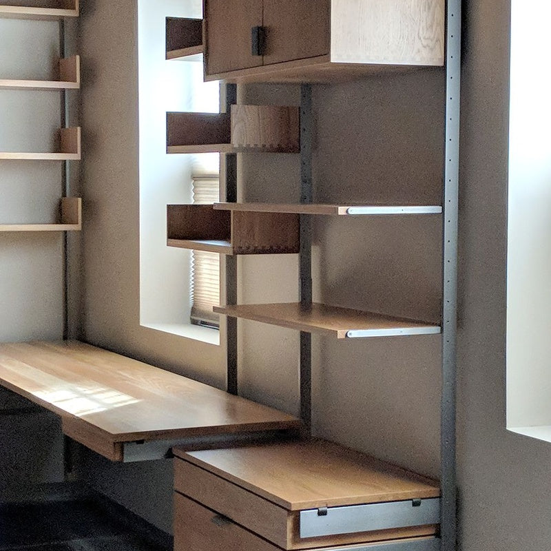 Modular Storage Wall Two Towers with a Desk Module in Solid Oak